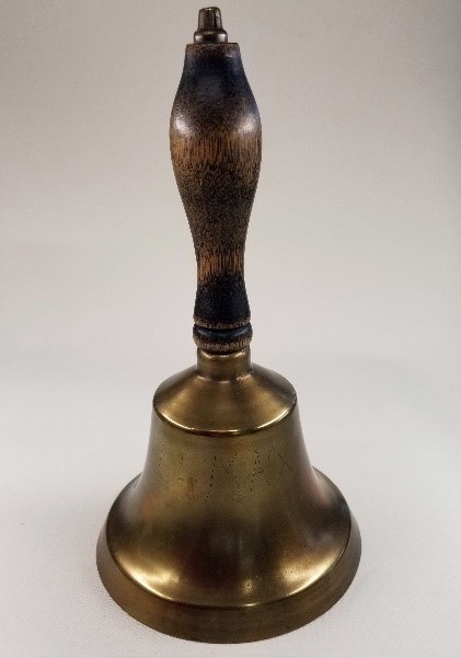 A brass school bell used by Helen