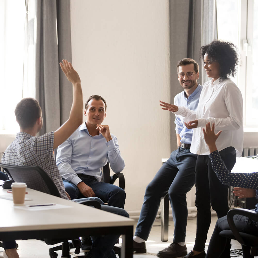 Workers in an office having a discussion